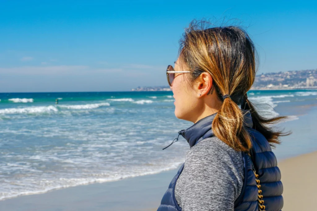 Reno therapy client for depression and anxiety overlooking tranquil ocean