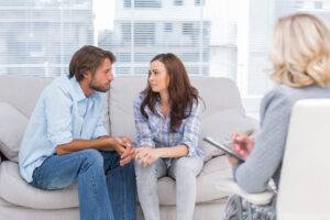 will my insurance cover therapy? image of couple asking question: will my insurance cover therapy?
