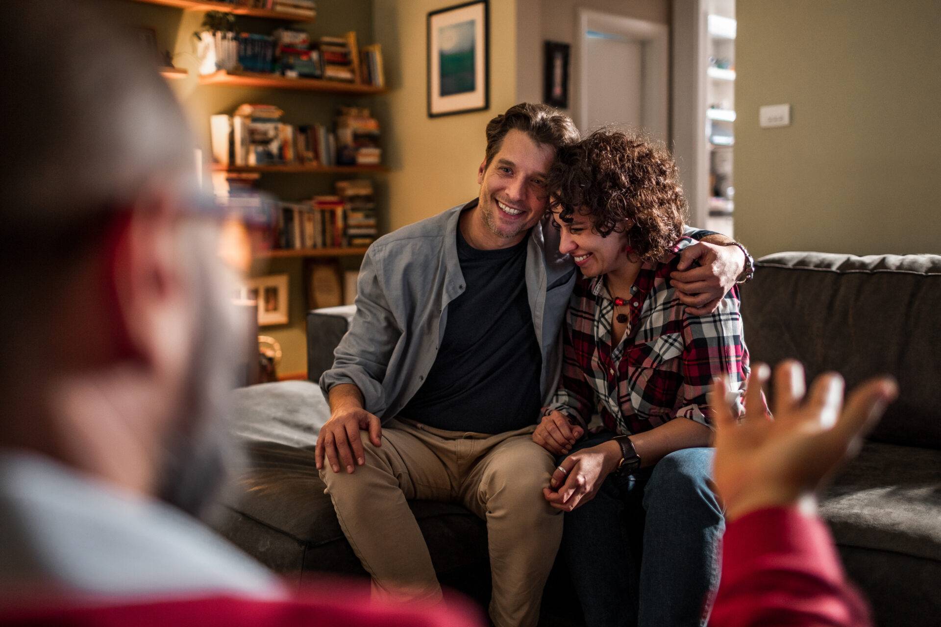 Couple in conversation with a therapist or counselor at home therapy services in reno nv with couple.