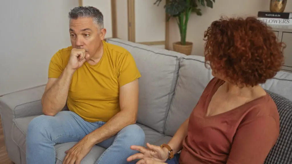 middle aged couple serious conversation