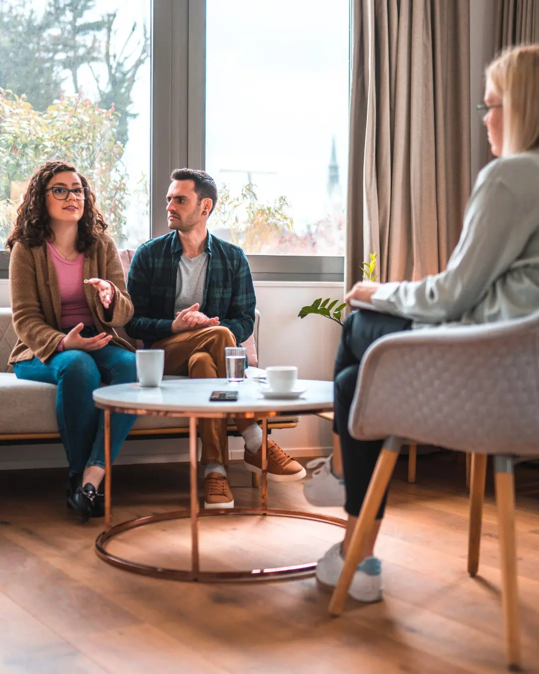 Couple talking with a therapist during a counseling session in Reno and Carson City