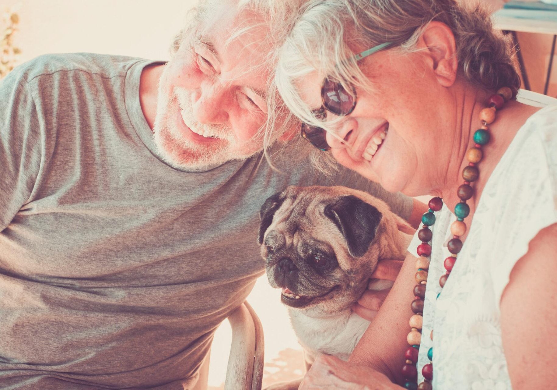 attachment therapy in reno, nv, image of couple with dog illustrating benefits of attachment-based therapy