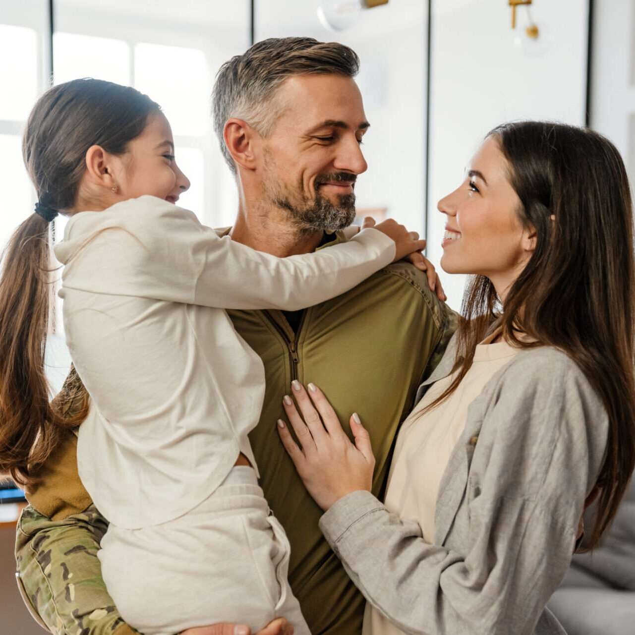 Happy couple with military husband. Clients in Couples Counseling in Reno, NV with Individual & Relationship Counseling Associates